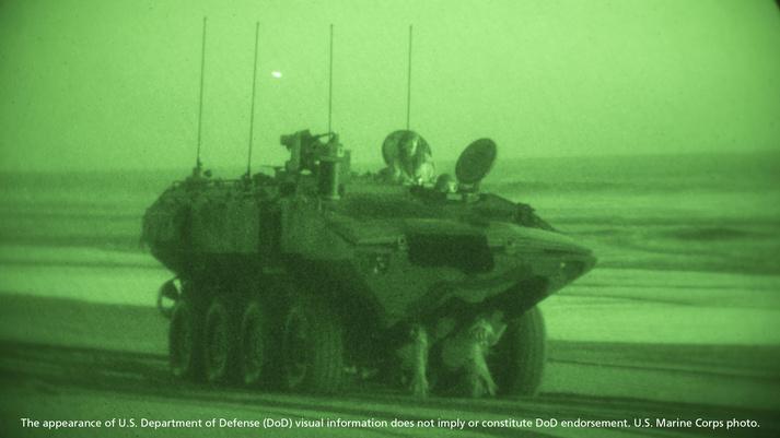 U.S. Marines with Amphibious Vehicle Test Branch, Marine Corps Tactical Systems Support Activity, stage new Amphibious Combat Vehicles on the beach during low-light surf transit testing on Marine Corps Base Camp Pendleton, California. Photo credit: U.S. Marine Corps