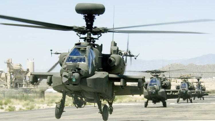 سرب من الطوافات الهجومية AH-64D المجهّزة برادار LONGBOW. الصورة: Boeing