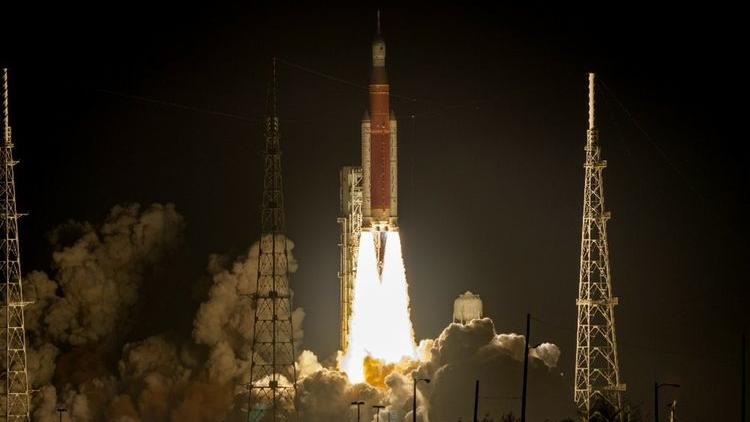 NASA’s Space Launch System rocket, with twin Northrop Grumman solid rocket boosters, lifts off for the first Artemis program launch. Photo Credit: NASA