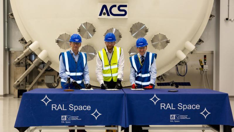 From left to right: Ian Annett, Deputy CEO UK Space Agency, Matt Fletcher Head of Environmental Test at STFC RAL Space, and Richard Budd, Head of Secure Communications UK, US & Australia, Airbus Defence and Space, at the signing ceremony for SKYNET 6A testing -  copyright - STFC RAL Space