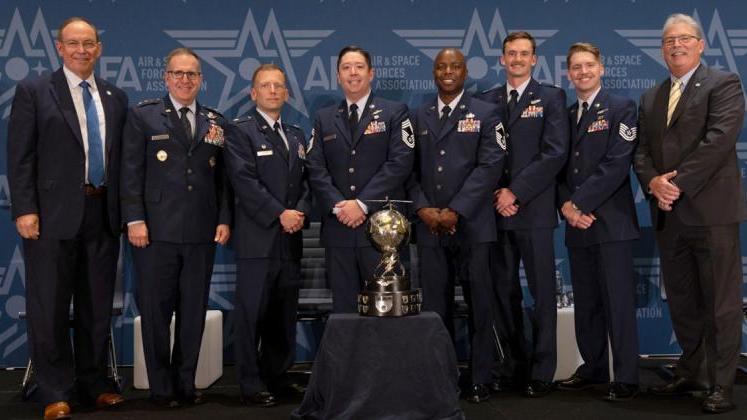 From left to right: Lt Gen (Ret.) Dave Deptula, Lt Gen James Slife, Lt Col David Payne, CMSgt Jared Bond, SMSgt TeVarian Pruitt, TSgt Keith Proze, Maj Corey Godwin, and GA-ASI President David R. Alexander. Credit: Air & Space Forces Association.