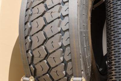 Mack Defense is partnering with XPER, Inc. to provide vehicle accessories for the Mack® Granite®-based M917A3 heavy dump truck like the Spare Tire Carrier and the transparent armor pictured above.