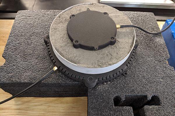 Astrobotic’s wireless charging system is tested with lunar regolith, or dust, simulant between transmitters.