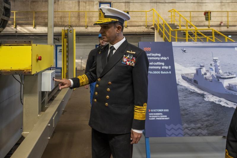 Chief of the Naval Staff Admiral Muhammad Amjad Khan Niazi engages the steel cutting machine at Damen Shipyards Galatí
